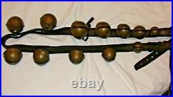 12 antique brass petal sleigh bells on leather strap-all numbered Barn Find