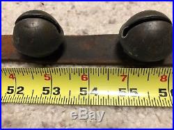 21 Antique Brass Petal Sleigh Bells Shank Style on 88 Leather Buckled Strap