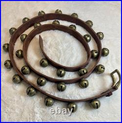 30 Brass Tucker Bells On An Original 76 Long 1 1/4 Wide Strap. Nice Condition