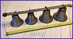 4 Antique brass Sleigh Bells on a 16 iron bar. Horse / Carriage