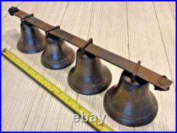 4 Antique brass Sleigh Bells on a 16 iron bar. Horse / Carriage
