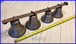 4 Antique brass Sleigh Bells on a 16 iron bar. Horse / Carriage