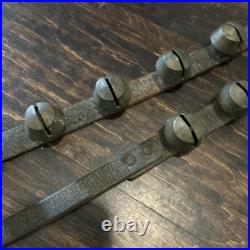 67 ANTIQUE BRASS SLEIGH BELLS ON LEATHER STRAP heavy