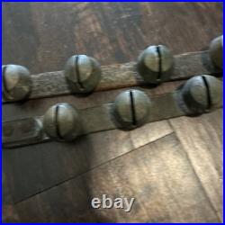 67 ANTIQUE BRASS SLEIGH BELLS ON LEATHER STRAP heavy