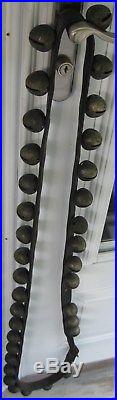 ANTIQUE SET OF 34 BRASS SLEIGH BELLS ON LEATHER STRAP WithBUCKLE