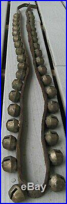ANTIQUE SET OF ACORN SHAPED BRASS SLEIGH BELLS ON LEATHER STRAP WithBUCKLE