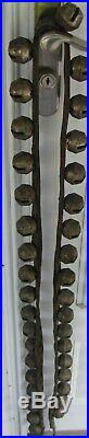 ANTIQUE SET OF ACORN SHAPED BRASS SLEIGH BELLS ON LEATHER STRAP WithBUCKLE