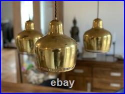 Alvar Aalto. Golden Bell Chandelier manufactured by Louis Poulsen