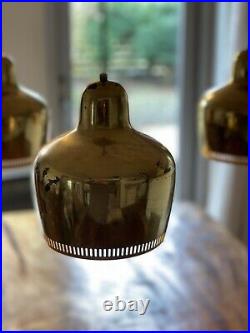 Alvar Aalto. Golden Bell Chandelier manufactured by Louis Poulsen