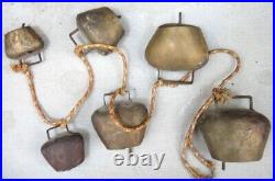 Antique 6 HANGING BRASS COWBELLS graduated vintage metal knocker rust color