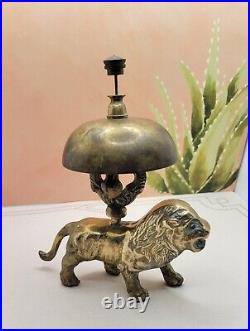 Antique Brass Lion Hotel Bell. Ringer is intact and works great