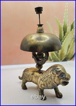Antique Brass Lion Hotel Bell. Ringer is intact and works great