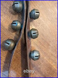 Antique Brass Sleigh Bells On Leather Strap Approx. 74