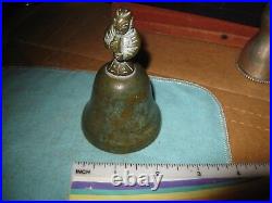 Antique Engraved Brass Bronze Bell With Figure in Cloak Holding Treasure