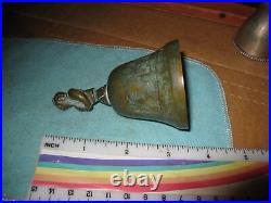 Antique Engraved Brass Bronze Bell With Figure in Cloak Holding Treasure