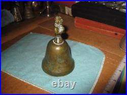 Antique Engraved Brass Bronze Bell With Figure in Cloak Holding Treasure