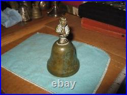 Antique Engraved Brass Bronze Bell With Figure in Cloak Holding Treasure