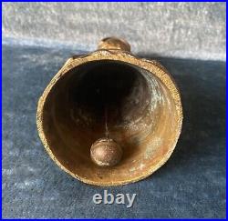 Antique Engraved Brass Bronze Bell With Figure in Cloak Holding Treasure. 5x2.5