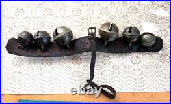Antique Graduated Crotal sleigh bells on 19 leather strap