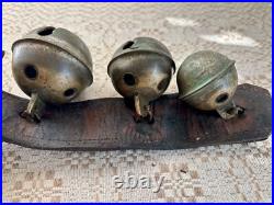 Antique Graduated Crotal sleigh bells on 19 leather strap