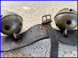 Antique Graduated Crotal sleigh bells on 19 leather strap