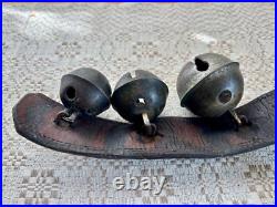 Antique Graduated Crotal sleigh bells on 19 leather strap