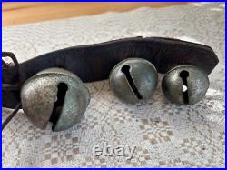 Antique Graduated Crotal sleigh bells on 19 leather strap