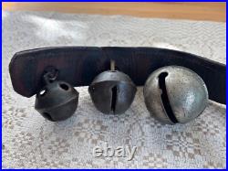 Antique Graduated Crotal sleigh bells on 19 leather strap