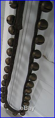 Antique Strand Of 35 Brass Coated Sleigh Bells On Leather Strap That Buckles