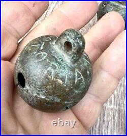 Antique bells. From old bronze With the inscription Victoria