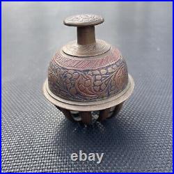 Antique brass elephant claw bell