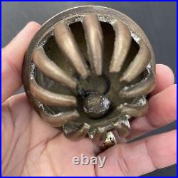 Antique brass elephant claw bell