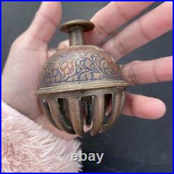 Antique brass elephant claw bell