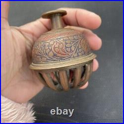 Antique brass elephant claw bell