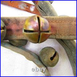 Antique brass sleigh bells, 36 on leather strap