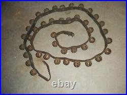 Antique brass sleigh bells 42 on single old leather horse strap with buckle