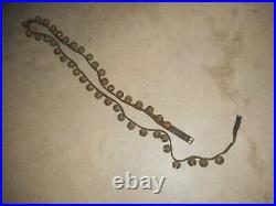 Antique brass sleigh bells 42 on single old leather horse strap with buckle