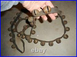 Antique brass sleigh bells 42 on single old leather horse strap with buckle