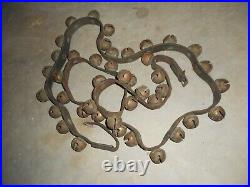 Antique brass sleigh bells 42 on single old leather horse strap with buckle