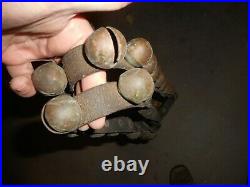 Antique brass sleigh bells 42 on single old leather horse strap with buckle