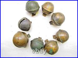 Antique brass sleigh bells, 8 pieces