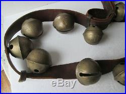 Antique brass sleigh bells lge. 90in. Strap with 21 large bells 1.75in. To 2.50 in