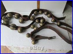 Antique brass sleigh bells lge. 90in. Strap with 21 large bells 1.75in. To 2.50 in