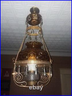 Antique hanging brass oil / kerosene parlor lamp