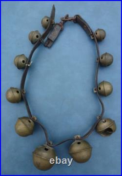 Antique numbered Brass Horse Sleigh Bells Leather Strap 11 Bells as found