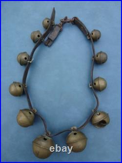 Antique numbered Brass Horse Sleigh Bells Leather Strap 11 Bells as found