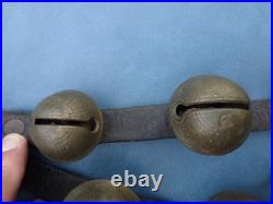 Antique numbered Brass Horse Sleigh Bells Leather Strap 11 Bells as found