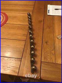 Early Leather Strap Of 12 Brass Sleigh Bells