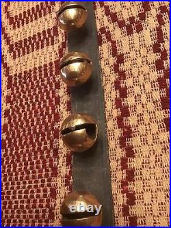 Early Leather Strap Of 27 Brass Sleigh Bells
