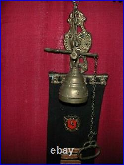 LOOK! Antique KRAAIJER hanging Bell on decorated banner great Ski Lodge item